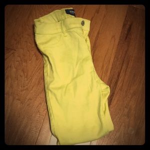 Yellow, stretchy, ballerina jeans. 7/8 length.